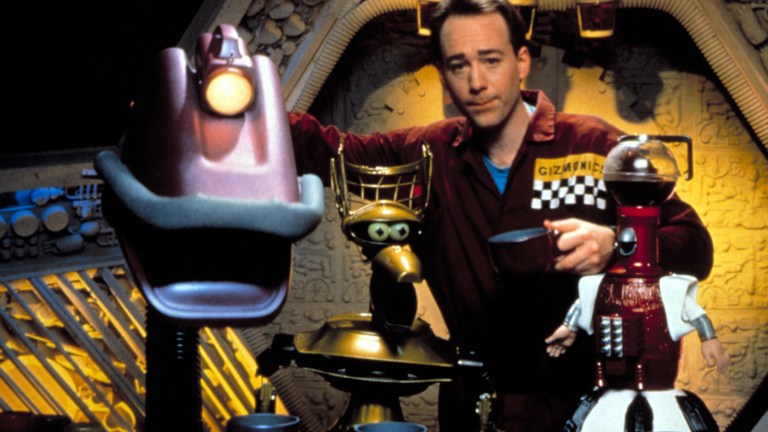 Joel and the Bots in MST3K. MYSTERY SCIENCE THEATER 3000, Gypsy, Joel Hodgson, Tom Servo, 1988-1999. (c) Comedy Central/ Courtesy: Everett Collection.