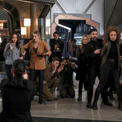 Legends of Tomorrow -- "Knocked Down, Knocked Up" (L-R): Lisseth Chavez as Esperanza "Spooner" Cruz, Tala Ashe as Zari Tarazi, Jes Macallan as Ava Sharpe, Caity Lotz as Sara Lance, Olivia Swann as Astra Logue, Adam Tsekhman as Gary Green and Amy Pemberton as Gideon