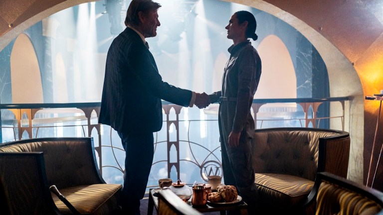 Sean Bean as Wilford and Jennifer Connelly as Melanie shake hands in Snowpiercer season 3 episode 10.