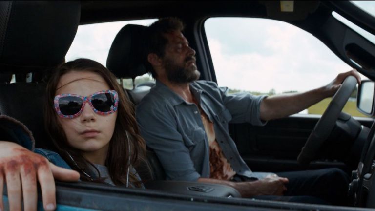 Dafne Keen and Hugh Jackman as Laura and Logan