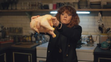 Nadia (Natasha Lyonne) wields a turkey in Russian Doll season 1