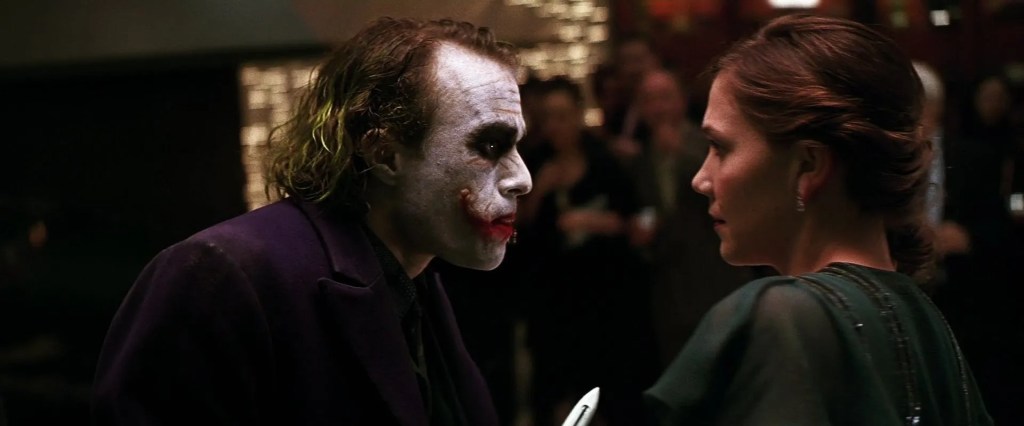 Heather Ledger as Joker with Maggie Gyllenhaal in The Dark Knight