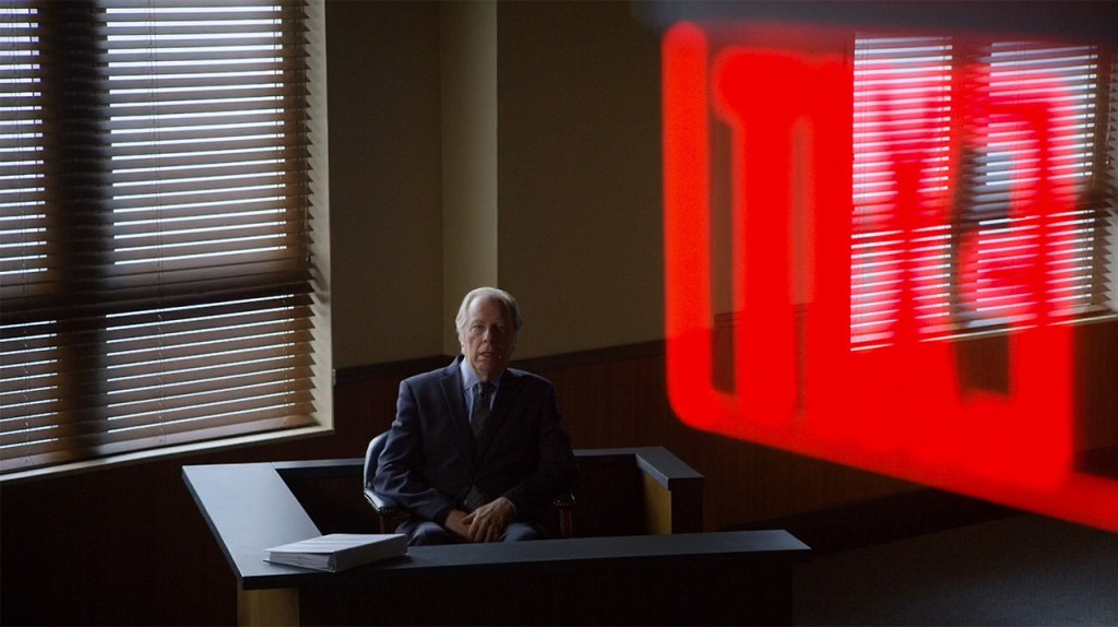 Chuck McGill (Michael McKean) looking at an exit sign in Better Call Saul Season 3 Episode 3.  Photo Credit: AMC
