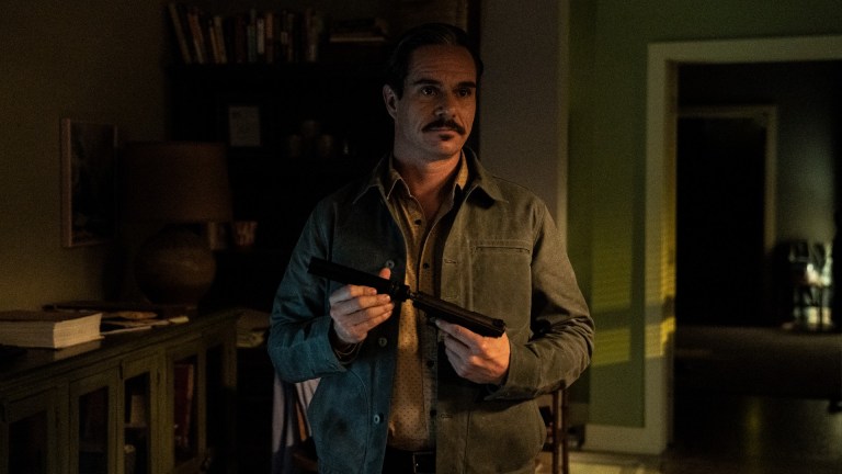 Lalo Salamanca (Tony Dalton) applies a silencer to his pistol in Better Call Saul season 6 episode 7