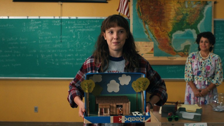 Jane Hopper a.k.a. Eleven (Millie Bobby Brown) with a diorama in Stranger Things Season 4