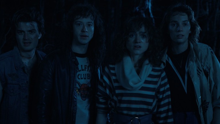 Steve (Joe Keery), Eddie (Joseph Quinn), Nancy (Natalia Dyer), and Robin (Maya Hawke) in the Upside Down in Stranger Things season 4