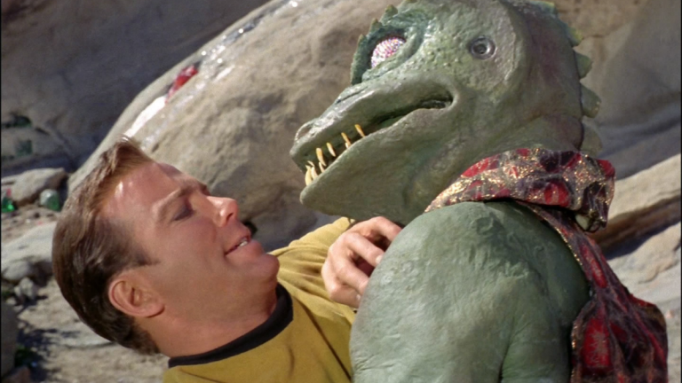 Captain Kirk and a Gorn in Star Trek "Arena"
