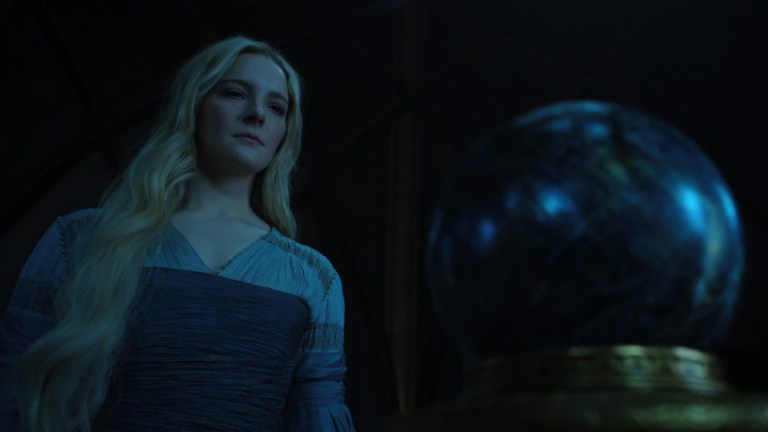 Galadriel (Morfydd) Clark gazes upon the Palantir in The Lord of the Rings: The Rings of Power