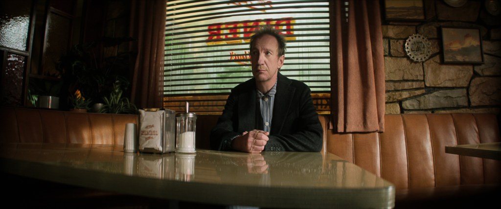 The Sandman. David Thewlis as John Dee in episode 105 of The Sandman. Cr. Courtesy of Netflix © 2022
