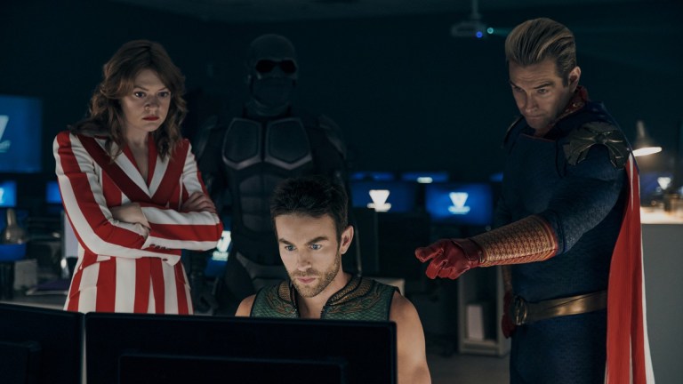 Ashley, Black Noir, The Deep, and Homelander gather around a computer on The Boys season 3