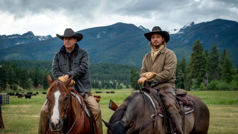 John Dutton (Kevin Costner) and Kayce Dutton (Luke Grimes) on Yellowstone.