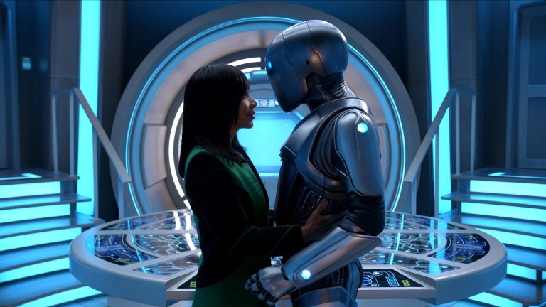 The Orville: New Horizons -- “Future Unknown” - Episode 310 -- A celebration is underway aboard the ship on the season three finale of “The Orville: New Horizons”. Dr. Claire Finn (Penny Johnson Jerald), and Issac (Mark Jackson), shown. (Photo by: Gilles Mingasson/Hulu)
