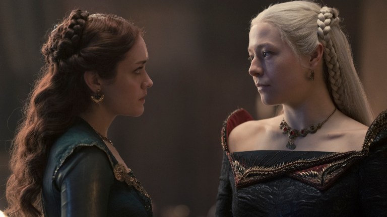 [L-R] Queen Alicent Hightower (Olivia Cooke) and Princess Rhaenrya Targaryen (Emma D'Arcy) stare at each other