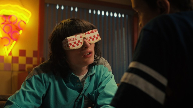 Mike Wheeler (Finn Wolfhard) wearing pizza glasses on Stranger Things