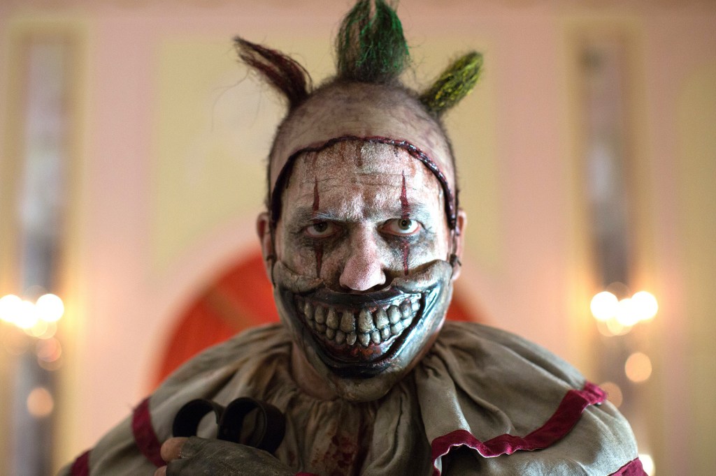 AMERICAN HORROR STORY: FREAK SHOW "Massacres and Matinees"- Episode 402 (Airs Wednesday, October 15, 10:00 PM e/p) --Pictured: John Carroll Lynch as Twisty the Clown. CR: Michele K. Short/FX