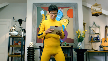 Phil Wang in a yellow Kill Bill jumpsuit on Taskmaster