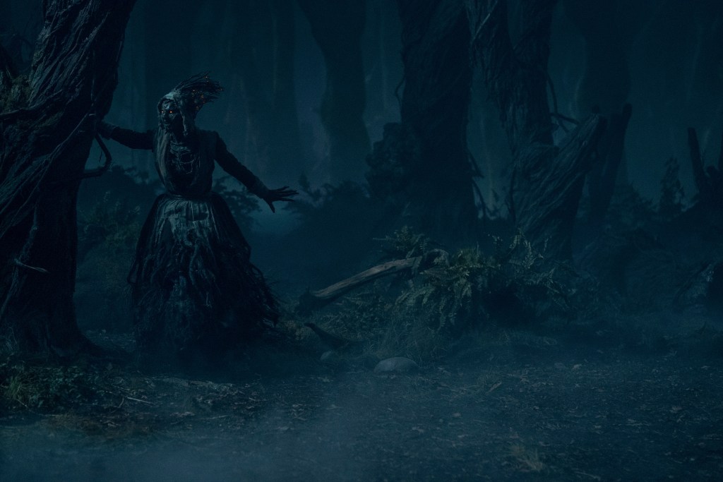 Guillermo del Toro's Cabinet Of Curiosities. Lize Johnston as Keziah/Witch in episode “Dreams in the Witch House” of Guillermo del Toro's Cabinet Of Curiosities. Cr. Ken Woroner/Netflix © 2022