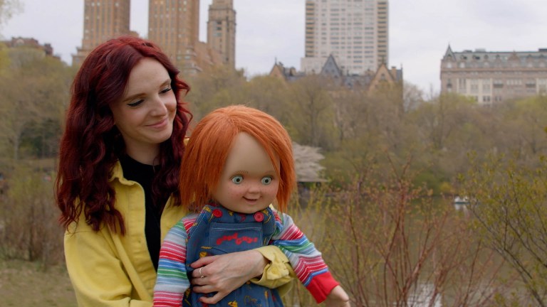 Kyra Elise Gardner and Chucky in LIVING WITH CHUCKY