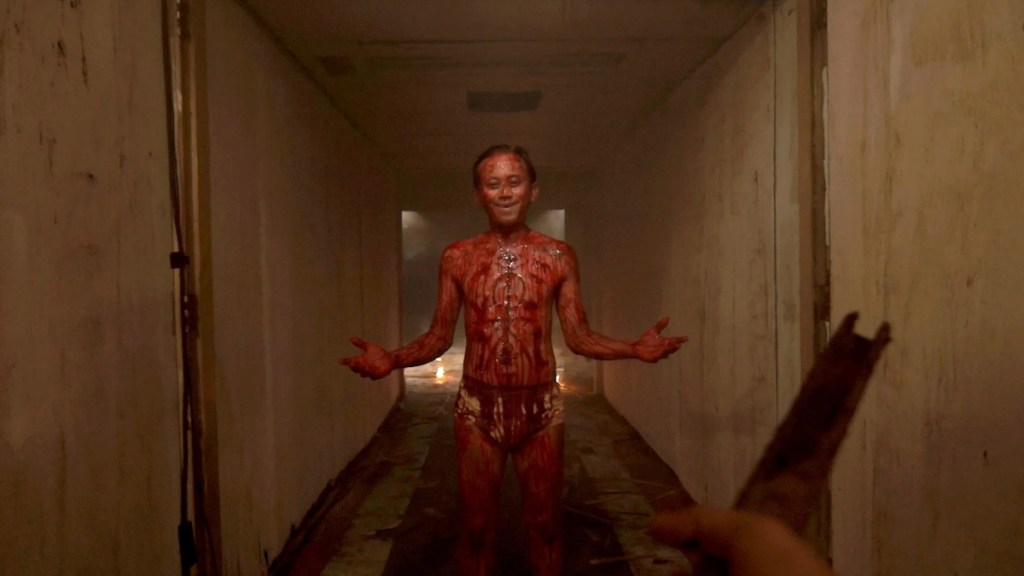 Guy covered in blood in V/H/S 2