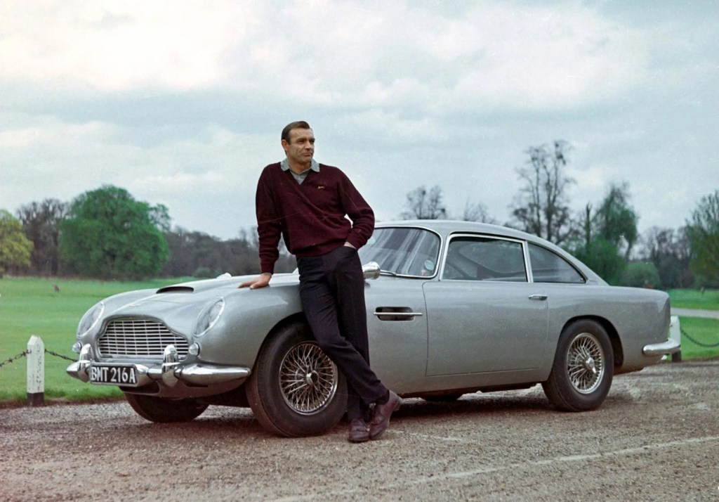 Sean Connery and Aston Martin DB5 in Goldfinger