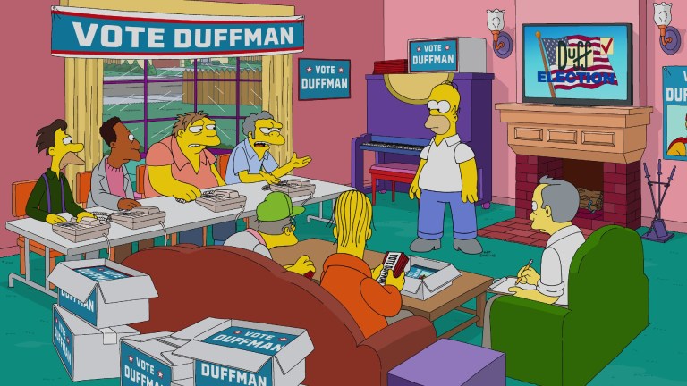 THE SIMPSONS: When Homer becomes Duffman’s girl-dad hero, they go on a road trip with Lisa that threatens to expose Homer's terrible parenting in the all-new "From Beer to Paternity" episode of THE SIMPSONS airing Sunday, November 13 (8:00-8:31 PM ET/PT) on FOX.