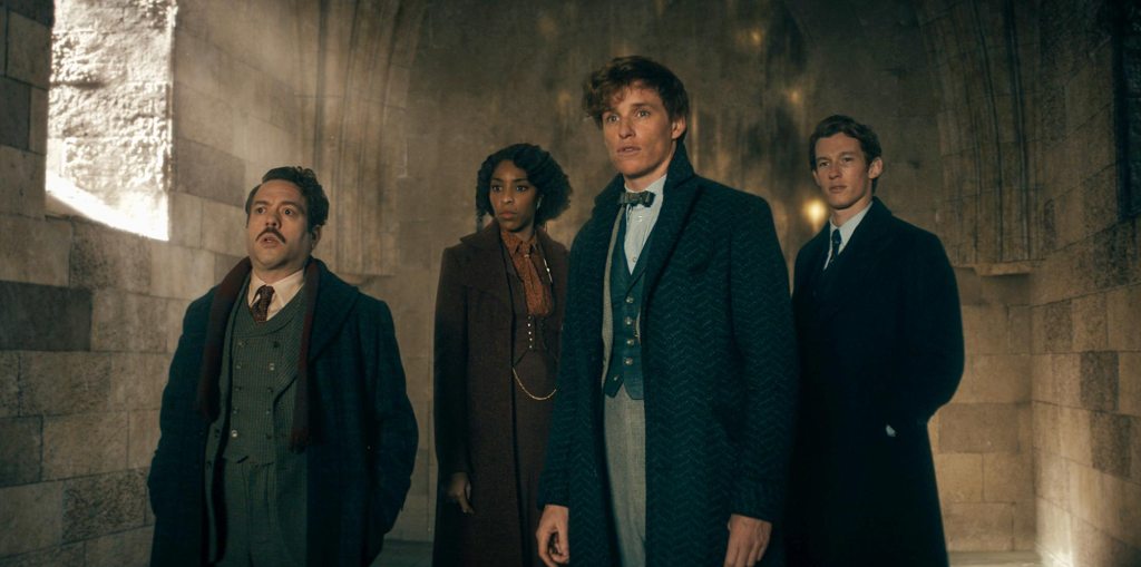 FANTASTIC BEASTS: THE SECRETS OF DUMBLEDORE  Copyright: © 2022 Warner Bros. Entertainment Inc. All Rights Reserved  Photo Credit: Courtesy of Warner Bros. Pictures  Caption: (L-R) DAN FOGLER as Jacob Kowalski, JESSICA WILLIAMS as Eulalie “Lally” Hicks, EDDIE REDMAYNE as Newt Scamander and CALLUM TURNER as Theseus Scamander in Warner Bros. Pictures' fantasy adventure &ldquo;FANTASTIC BEASTS: THE SECRETS OF DUMBLEDORE,” a Warner Bros. Pictures release.