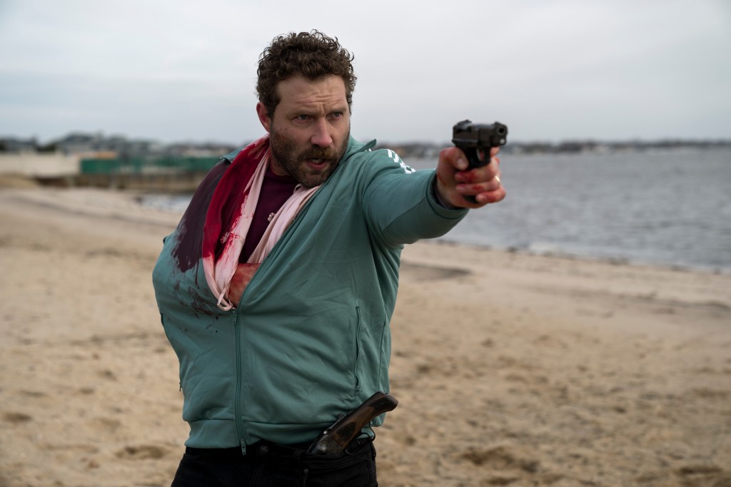 Kaleidoscope. Jai Courtney as Bob Goodwin in episode “Pink” of Kaleidoscope. Cr. Clifton Prescod/Netflix © 2022