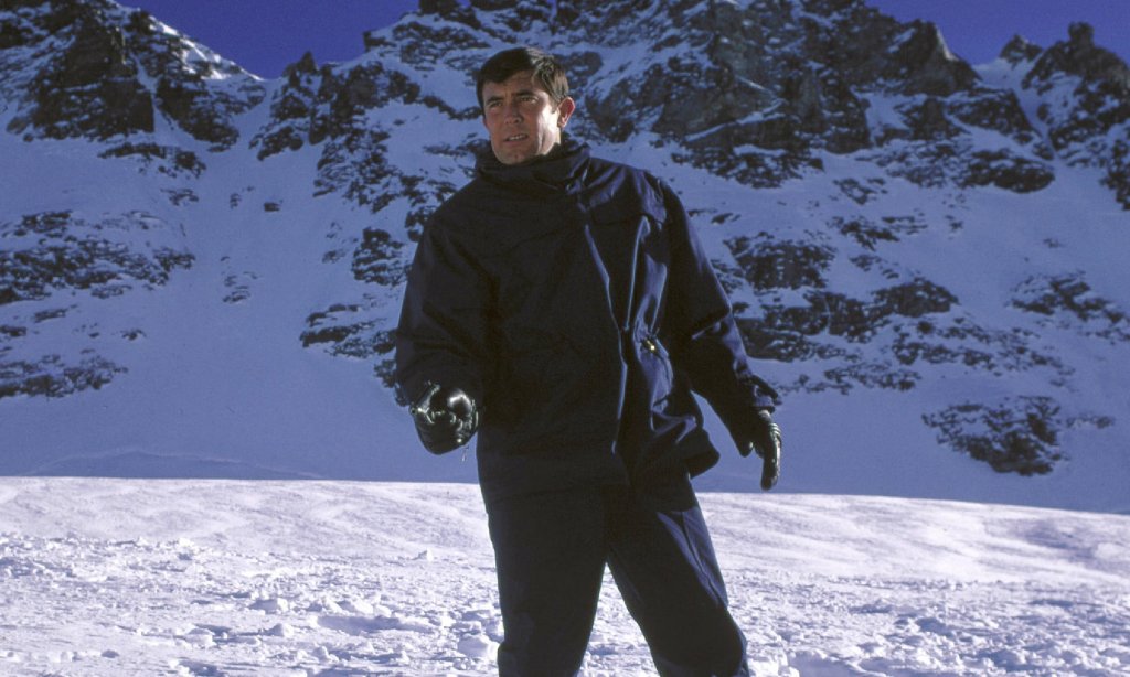 George Lazenby as James Bond in Snow in On Her Majesty's Secret Service