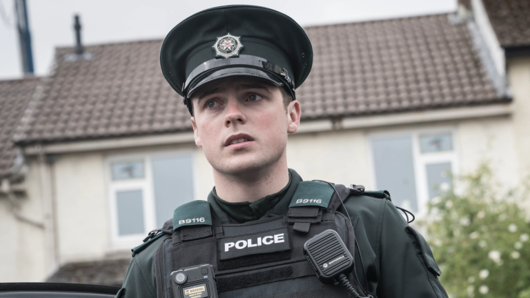 Nathan Braniff as Tommy Foster in police uniform in BBC One's Blue Lights