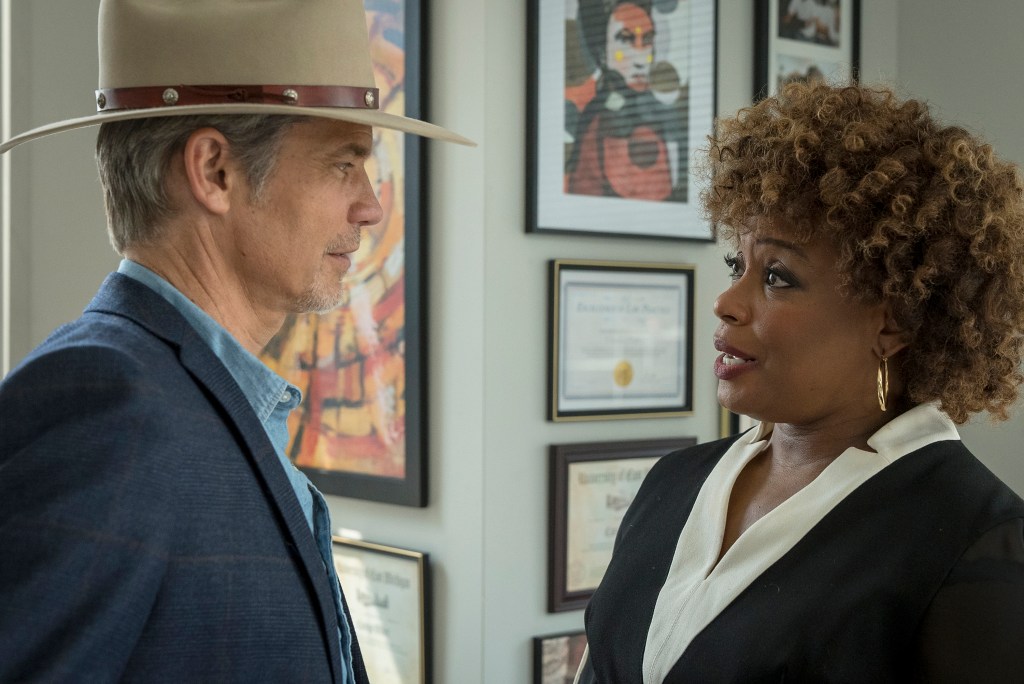 JUSTIFIED: CITY PRIMEVAL "The Oklahoma Wildman" Episode 2 (Airs Tuesday, July 18) Pictured: (l-r) Timothy Olyphant as Raylan Givens, Aunjanue Ellis as Carolyn Wilder. CR: Chuck Hodes/FX