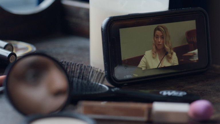 Amber Heard seen on a cellphone in Netflix's Depp v. Heard.