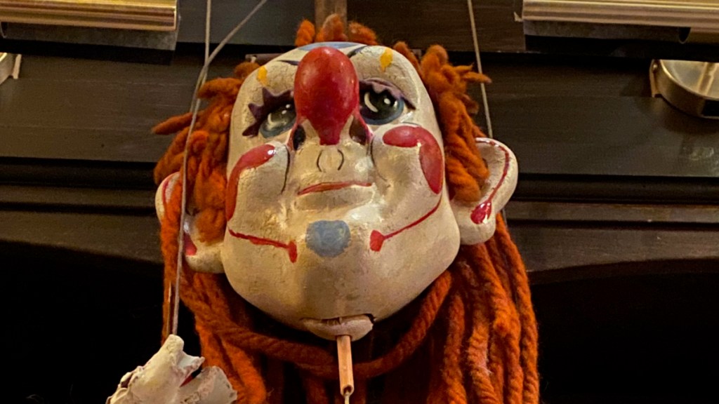 Good Omens set tour Magic Shop puppet Dolly