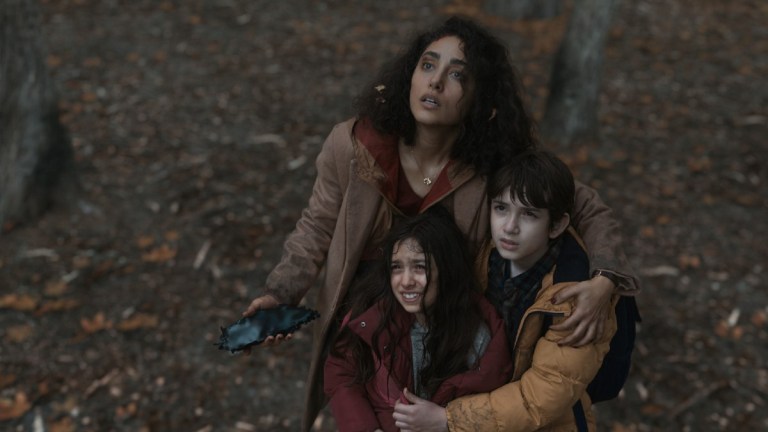 Golshifteh Farahani, Azhy Robertson and Tara Moayedi in “Invasion,” now streaming on Apple TV+.