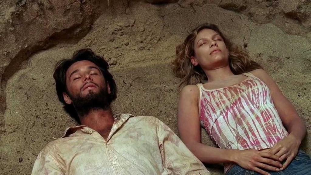 Nikki and Paolo on the beach in Lost episode Expose