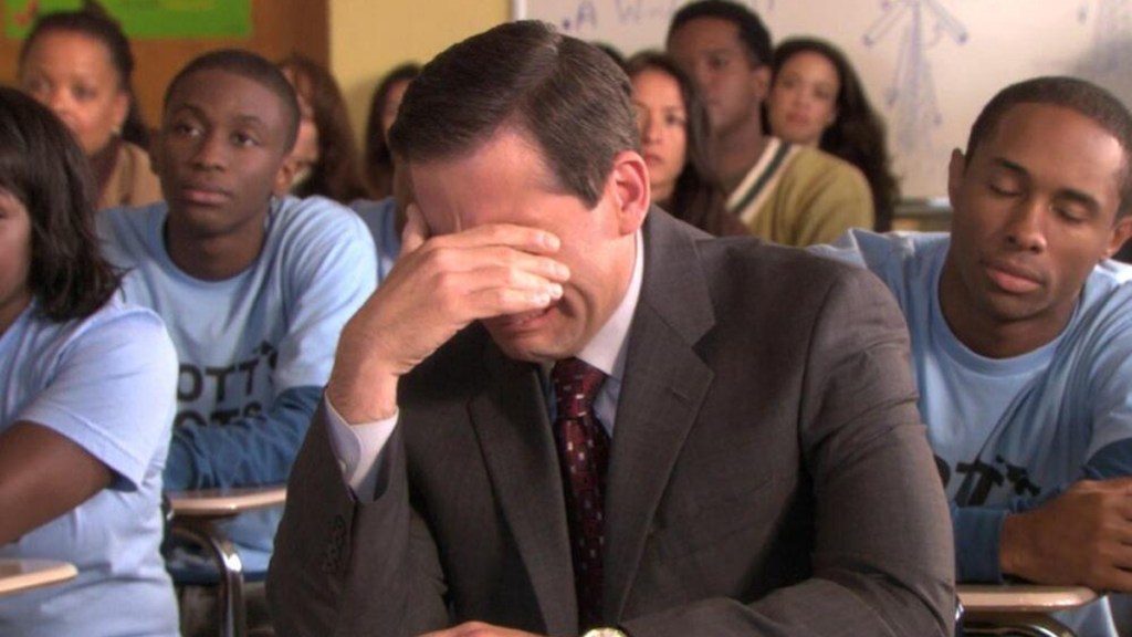 Steve Carrell with head in his hands in The Office episode "Scott's Tots"