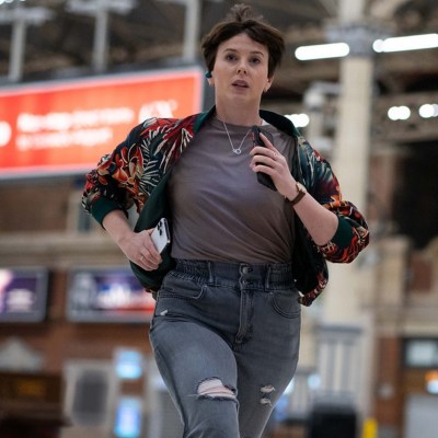 Alexandra Roach as Abby running through Victoria Station in BBC One's Nightsleeper