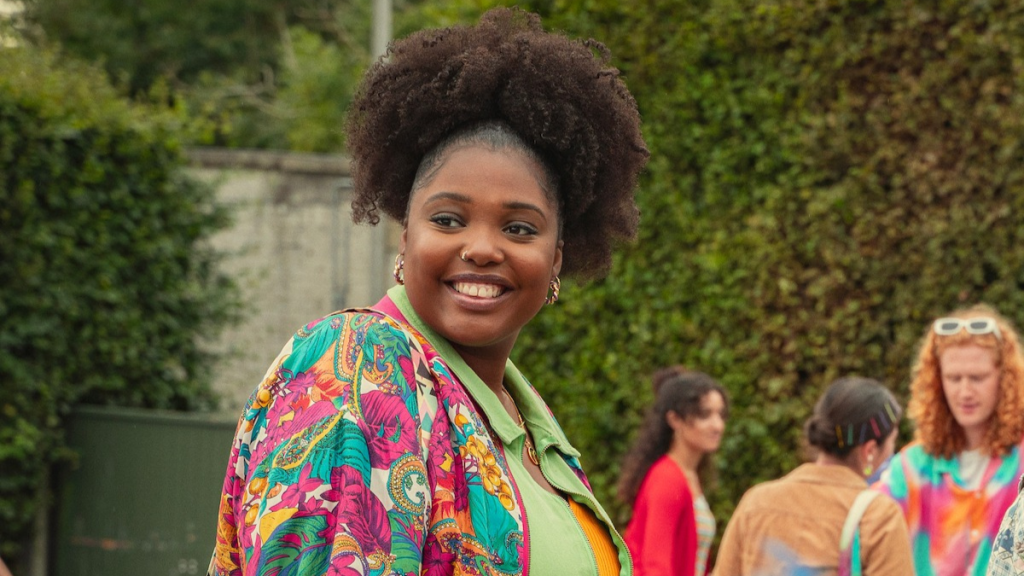 Alexandra James as Aisha in Sex Education