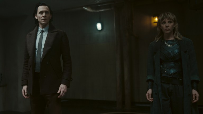 Tom Hiddleston as Loki and Sophia Di Martino as Sylvie in Marvel Studios' LOKI,