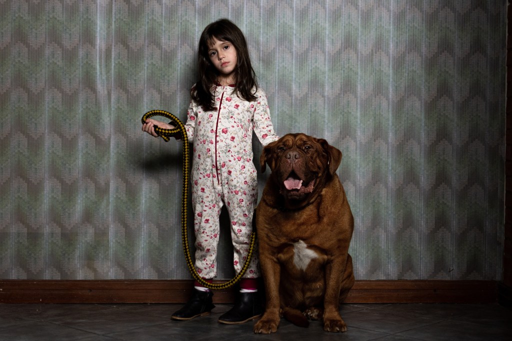 little girl and dog in When Evil Lurks