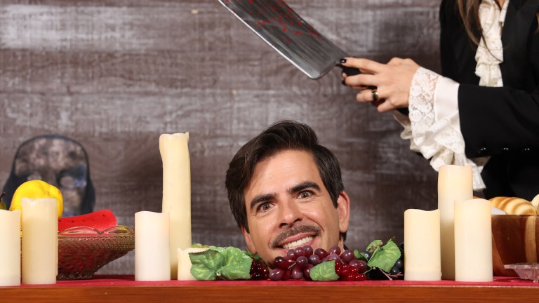Eli Roth Thanksgiving Photo with knife at table