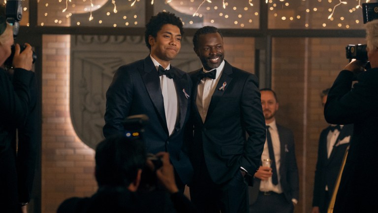 Andre Anderson (Chance Perdomo) stands with his father Polarity (Sean Patrick Thomas) at a black tie charity event for God U in Prime Video's Gen V