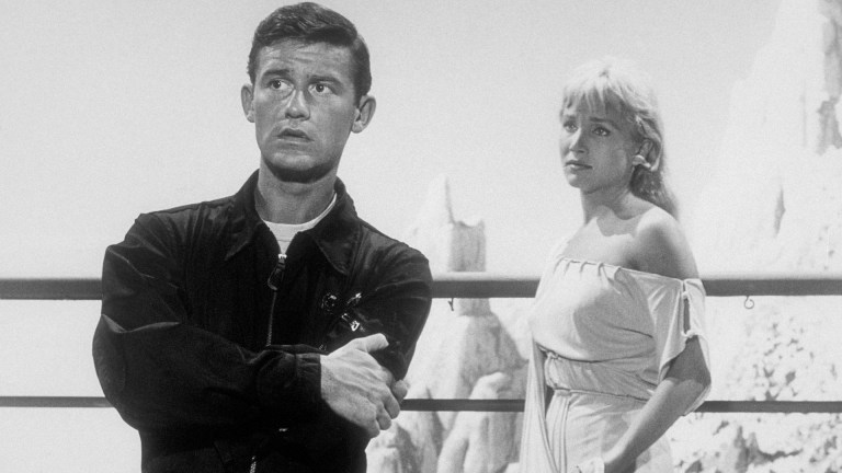 English actor Roddy McDowall (1928 - 1998), as Sam Conrad, and American actress Susan Oliver (1932 - 1990) as Teenya, in 'People Are Alike All Over', an episode in the TV series 'The Twilight Zone', 1960.