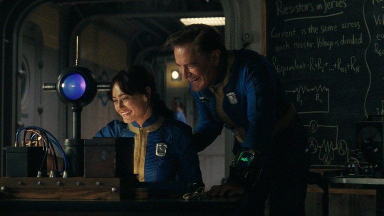 (L-R) Ella Purnell (Lucy) and Kyle MacLachlan (Overseer Hank) in “Fallout”