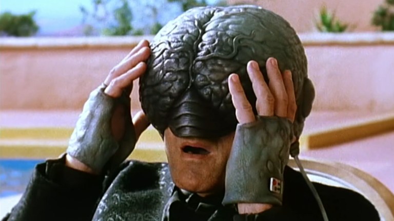 A man in a brain-shaped helmet from Dennis Potter's TV series Cold Lazarus on Channel 4