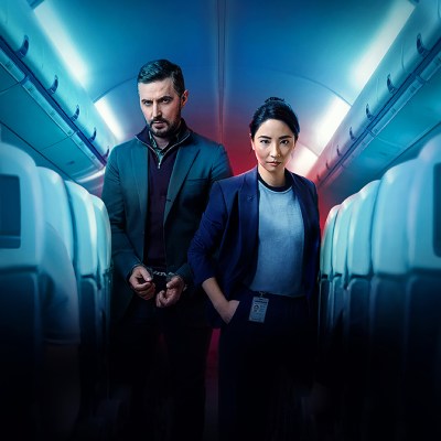 Richard Armitage and Jing Lusi as Dr Nolan and Hana Li on a plane in ITV's Red Eye