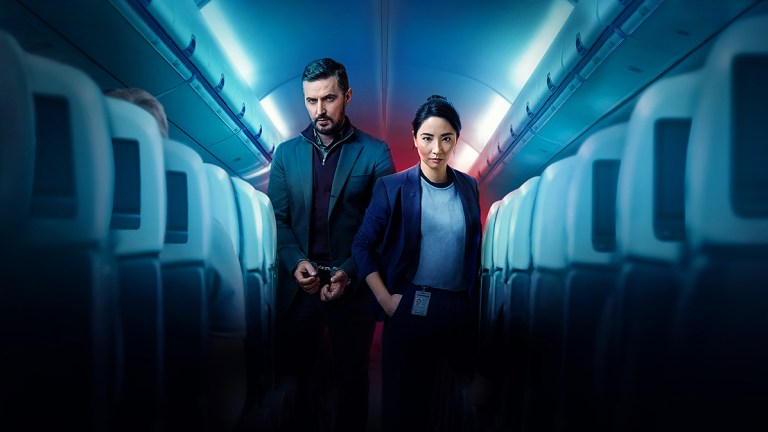 Richard Armitage and Jing Lusi as Dr Nolan and Hana Li on a plane in ITV's Red Eye