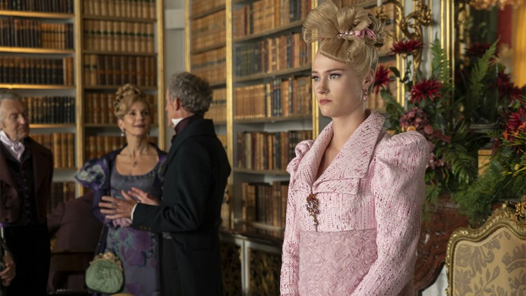 Jessica Madsen as Cressida in Bridgerton, wearing a pink gown and jacket