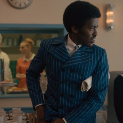 Doctor Who screengrab from The Devil's Chord - the Doctor and Ruby and the tea lady