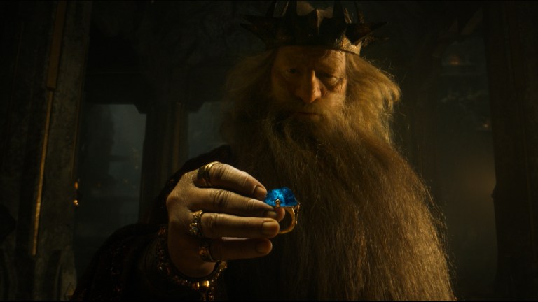 Screenshot from The Lord of The Rings: The Rings of Power season 2 trailer. Durin III holds a blue ring.