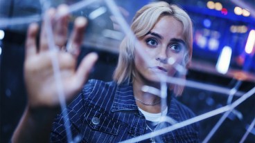 Millie Gibson as Ruby Sunday in front of cracked glass in the Doctor Who series 14 finale
